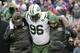 New York Jets defensive end Muhammad Wilkerson (96) is helped off the field during the second half of an NFL football game against the Buffalo Bills, Sunday, Jan. 3, 2016, in Orchard Park, N.Y. (AP Photo/Bill Wippert)