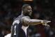Los Angeles Clippers guard Chris Paul acknowledges a fan during the first half of an NBA basketball game against the Miami Heat, Sunday, Feb. 7, 2016, in Miami. (AP Photo/Lynne Sladky)