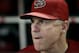 Arizona Diamondbacks manager Chip Hale looks on from the dugout during the start of a baseball game against the Houston Astros, Sunday, Oct. 4, 2015, in Phoenix. The Diamondbacks defeated the Astros 5-3. (AP Photo/Ralph Freso)