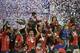 Chilean players celebrate with the trophy of the 2015 Copa America football championship, in Santiago, Chile, on July 4, 2015. AFP PHOTO / NELSON ALMEIDA (Photo credit should read NELSON ALMEIDA/AFP/Getty Images)