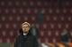 Liverpool's German headcoach Juergen Klopp follows the warm up ahead of the UEFA Europa League Round of 32 football match between FC Augsburg and Liverpool FC in Augsburg, southern Germany on February 18, 2016.
/ AFP / Christof STACHE (Photo credit should read CHRISTOF STACHE/AFP/Getty Images)