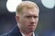 Paul Scholes as a television pundit before the English Premier League soccer match between Everton and Chelsea at Goodison Park Stadium, Liverpool, England, Saturday Sept. 12, 2015. (AP Photo/Jon Super)