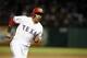 Texas Rangers' Leonys Martin sprints home scoring on a Josh Hamilton single in the ninth inning of a baseball game Thursday, July 30, 2015, in Arlington, Texas. (AP Photo/Tony Gutierrez)