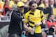 coach Jurgen Klopp of Borussia Dortmund give instructions to Neven Subotic of Borussia Dortmund during the Bundesliga match between Borussia Dortmund and Werder Bremen on May 23, 2015 at the Signal Iduna Park in Dortmund, Germany.(Photo by VI Images via Getty Images)