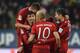(L-R) Bayern Munich's midfielder Joshua Kimmich, Bayern Munich's striker Thomas Mueller, Bayern Munich's Dutch midfielder Arjen Robben and Bayern Munich's Polish striker Robert Lewandowski celebrate after the third goal for Munich during the German first division Bundesliga football match of FC Augsburg vs FC Bayern Munich in Augsburg, southern Germany, on February 14, 2016. / AFP / CHRISTOF STACHE / RESTRICTIONS: DURING MATCH TIME: DFL RULES TO LIMIT THE ONLINE USAGE TO 15 PICTURES PER MATCH AND FORBID IMAGE SEQUENCES TO SIMULATE VIDEO. == RESTRICTED TO EDITORIAL USE == FOR FURTHER QUERIES PLEASE CONTACT DFL DIRECTLY AT 49 69 650050 (Photo credit should read CHRISTOF STACHE/AFP/Getty Images)