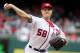 FILE - In this Sept. 27, 2015 file photo, Washington Nationals relief pitcher Jonathan Papelbon pitches in the eighth inning of a baseball game against the Philadelphia Phillies at Nationals Park in Washington. Before the season began, no one was shy about predicting big things for the Washington Nationals. Not even the Nationals themselves, from Bryce Harper's