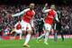 LONDON, ENGLAND - FEBRUARY 14: Theo Walcott of Arsenal celebrates after scoring his team's first goal during the Barclays Premier League match between Arsenal and Leicester City at Emirates Stadium on February 14, 2016 in London, England. (Photo by Ross Kinnaird/Getty Images)