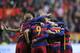 GIJON, SPAIN - FEBRUARY 17: Luis Suarez of FC Barcelona celebrates with teammates after scoring his team's 3rd goal during the La Liga match between Sporting Gijon and FC Barcelona at Estadio El Molinon on February 17, 2016 in Gijon, Spain. (Photo by Denis Doyle/Getty Images)