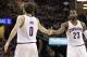 Cleveland Cavaliers' LeBron James (23) and Cleveland Cavaliers' Kevin Love (0) shake hands in the first half of an NBA basketball game against the Sacramento Kings, Monday, Feb. 8, 2016, in Cleveland. (AP Photo/Tony Dejak)