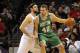 Dec 23, 2015; Charlotte, NC, USA; Boston Celtics forward center David Lee (42) looks to drive to the basket as he is defended by Charlotte hornets forward center Spencer Hawes (00) during the first half of the game at Time Warner Cable Arena. Mandatory Credit: Sam Sharpe-USA TODAY Sports