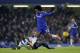 Chelsea's Willian, right, competes for the ball with Newcastle United's Cheick Tiote during the English Premier League soccer match between Chelsea and Newcastle United at Stamford Bridge stadium in London, Saturday, Feb. 13, 2016. (AP Photo/Matt Dunham)