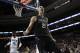 Phoenix Suns' Alex Len reacts after a dunk during the first half of an NBA basketball game against the Philadelphia 76ers, Tuesday, Jan. 26, 2016, in Philadelphia. (AP Photo/Matt Slocum)
