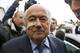FILE - In this Dec. 21, 2015 file photo, FIFA President Sepp Blatter arrives for a news conference in Zurich, Switzerland, after he was banned for 8 years from all football-related activities over a $2 million payment by FIFA to Michel Platini, the president of European soccer's ruling body UEFA. 2015 was the year when scandals off the field of play eclipsed exploits on it. (AP Photo/Matthias Schrader, File)