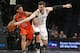 Brooklyn Nets center Andrea Bargnani (9) defends Oklahoma City Thunder guard Cameron Payne (22) as Payne drives down court in the first half of an NBA basketball game, Sunday, Jan. 24, 2016, in New York. (AP Photo/Kathy Willens)