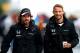SUZUKA, JAPAN - SEPTEMBER 25: Fernando Alonso of Spain and McLaren Honda and Jenson Button of Great Britain and McLaren Honda walk in the paddock during practice for the Formula One Grand Prix of Japan at Suzuka Circuit on September 25, 2015 in Suzuka. (Photo by Clive Rose/Getty Images)