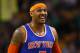 New York Knicks' Carmelo Anthony smiles during the second half of the New York Knicks 101-95 win over the Boston Celtics in an NBA basketball game in Boston Friday, Dec. 12, 2014. (AP Photo/Winslow Townson)