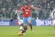 Napoli's Gonzalo Higuain challenges the ball with Juventus' Paul Pogba during a Serie A soccer match between Juventus and Napoli at the Juventus stadium, in Turin, Italy, Saturday, Feb. 13, 2016. (AP Photo/ Massimo Pinca)