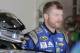Dale Earnhardt Jr looks from the garage during practice for Sunday's NASCAR Daytona 500 Sprint Cup series auto race at Daytona International Speedway in Daytona Beach, Fla., Friday, Feb. 19, 2016. (AP Photo/Terry Renna)