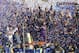 Denny Hamlin, center, celebrates in Victory Lane after winning the NASCAR Daytona 500 Sprint Cup Series auto race at Daytona International Speedway in Daytona Beach, Fla., Sunday, Feb. 21, 2016. (AP Photo/David Graham)