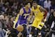 Los Angeles Lakers' D'Angelo Russell (1) drives against Cleveland Cavaliers' Kyrie Irving (2) in the second half of an NBA basketball game Wednesday, Feb. 10, 2016, in Cleveland. (AP Photo/Tony Dejak)