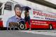 A dog and woman walks past a bus with an image of senatorial candidate and boxer Manny Pacquiao that will be used for campaigning for the May 9 national elections Saturday, Feb. 20, 2016 in Manila, Philippines. Pacquiao was criticized for his remarks regarding people in same-sex relationships. (AP Photo/Bullit Marquez)