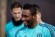 Chelsea's Nigerian midfielder John Obi Mikel (C) arrives to participate in a team training session at the club's complex in Cobham, Surrey on February 15, 2016.
Chelsea play Paris St-Germain in the last-16 round of matches in the Champions League on February 16, 2016. / AFP / ADRIAN DENNIS (Photo credit should read ADRIAN DENNIS/AFP/Getty Images)