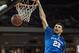 Kentucky guard Jamal Murray (23) dunks the ball during the second half of an NCAA college basketball game against South Carolina Saturday, Feb. 13, 2016, in Columbia, S.C. Kentucky defeated South Carolina 89-62. (AP Photo/Sean Rayford)
