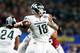 ARLINGTON, TX - DECEMBER 31: Connor Cook #18 of the Michigan State Spartans looks to pass against the Alabama Crimson Tide in the first quarter of the Goodyear Cotton Bowl at AT&T Stadium on December 31, 2015 in Arlington, Texas. (Photo by Tom Pennington/Getty Images)