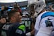 CHARLOTTE, NC - JANUARY 17: Cam Newton #1 of the Carolina Panthers meets Russell Wilson #3 of the Seattle Seahawks on the field after the NFC Divisional Playoff Game at Bank of America Stadium on January 17, 2016 in Charlotte, North Carolina. (Photo by Jamie Squire/Getty Images)