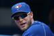 TORONTO, CANADA - MAY 24: Michael Saunders #21 of the Toronto Blue Jays looks on from the dugout during MLB game action against the Seattle Mariners on May 24, 2015 at Rogers Centre in Toronto, Ontario, Canada. (Photo by Tom Szczerbowski/Getty Images)