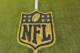 A general view of an NFL logo on the 50-yard line prior to an NFL football game between the Cleveland Browns and the Baltimore Ravens Monday, Nov. 30, 2015, in Cleveland. Baltimore won 33-27. (AP Photo/David Richard)
