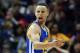 Golden State Warriors guard Stephen Curry (30) reacts after being charged with a foul in the first half of an NBA basketball game against the Atlanta Hawks, Monday, Feb. 22, 2016, in Atlanta. (AP Photo/John Bazemore)