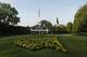 The sun rises over the Augusta National Golf Club house before practice rounds for the Masters golf tournament Wednesday, April 4, 2012, in Augusta, Ga. (AP Photo/Darron Cummings)