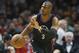 Los Angeles Clippers' Chris Paul controls the ball against the Golden State Warriors during the first half of an NBA basketball game, Saturday, Feb. 20, 2016, in Los Angeles. (AP Photo/Danny Moloshok)