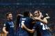 Atletico Madrid's Antoine Griezmann (unseen) celebrates with his team mates after scoring the second goal during the Champions League group C football match Galatasaray vs Atletico Madrid on September 15, 2015 at the TT Arena Stadium in Istanbul. AFP PHOTO / OZAN KOSE (Photo credit should read OZAN KOSE/AFP/Getty Images)