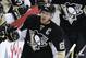 Pittsburgh Penguins' Sidney Crosby (87) returns to the bench after scoring an empty-net goal during the third period of the team's NHL hockey game against the Detroit Red Wings in Pittsburgh, Thursday, Feb. 18, 2016. The Penguins won 6-3. AP Photo/Gene J. Puskar)