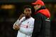 Liverpool's German manager Jurgen Klopp speaks with Liverpool's English striker Daniel Sturridge (L) during the English FA Cup fourth round replay football match between West Ham United and Liverpool at The Boleyn Ground in Upton Park, east London, on February 9, 2016. / AFP / GLYN KIRK / RESTRICTED TO EDITORIAL USE. No use with unauthorized audio, video, data, fixture lists, club/league logos or 'live' services. Online in-match use limited to 75 images, no video emulation. No use in betting, games or single club/league/player publications. / (Photo credit should read GLYN KIRK/AFP/Getty Images)