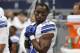 FILE - In this Sept. 27, 2015, file photo, Dallas Cowboys' Joseph Randle stands in the team bench area during an NFL football game against the Atlanta Falcons, in Arlington, Texas. Former Dallas Cowboys running back Joseph Randle was jailed early Wednesday, Nov. 25, 2015, after an altercation at a Kansas casino. Randle was asked to leave the Kansas Star Casino in Mulvane late Tuesday after causing some unspecified concerns on the casino floor, said Fred Waller, an enforcement agent with the Kansas Racing and Gaming Commission. Randle left, but then returned. Randle started arguing with security officers, and a scuffle ensued, Waller said. Several agents had to restrain him and he was taken to the county jail. (AP Photo/Brandon Wade, File)