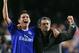 LONDON, United Kingdom: Chelsea's Frank Lampard (L) and manager Jose Mourinho celebrate their team's win over Barcelona after their second leg Champion's League football match at Stamford Bridge stadium in London 08 March, 2005. Chelsea won 4-2 and advances 5-4 on agrigate. AFP PHOTO/jJIM WATSON (Photo credit should read JIM WATSON/AFP/Getty Images)