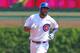 Aug 23, 2015; Chicago, IL, USA; Chicago Cubs center fielder Dexter Fowler (24) runs the bases after hitting a home run during the first inning against the Atlanta Braves at Wrigley Field. Mandatory Credit: Dennis Wierzbicki-USA TODAY Sports