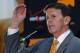 FILE - In this March 27, 2015, file photo, University of Tennessee athletic director Dave Hart gestures as he speaks to reporters about the firing of head basketball coach Donnie Tyndall, in Knoxville, Tenn. Hart is ready to look ahead to 2015-16 after a tumultuous year that included record fundraising and modest improvements on the field but also the abrupt firing of men's basketball coach Donnie Tyndall and criticism over the elimination of the Lady Vols nickname in all sports but basketball. (AP Photo/Wade Payne, File)