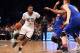 Feb 19, 2016; Brooklyn, NY, USA; Brooklyn Nets small forward Joe Johnson (7) drives against New York Knicks small forward Lance Thomas (42) and power forward Kristaps Porzingis (6) during the third quarter at Barclays Center. The Nets defeated the Knicks 109-98. Mandatory Credit: Brad Penner-USA TODAY Sports