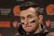 Cleveland Browns quarterback Johnny Manziel speaks with media members following the team's 30-13 loss to the Seattle Seahawks n an NFL football game, Sunday, Dec. 20, 2015, in Seattle. (AP Photo/Scott Eklund)
