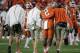 Clemson's Mackensie Alexander (2) is helped off the field during the first half of the NCAA college football playoff championship game Monday, Jan. 11, 2016, in Glendale, Ariz. (AP Photo/Chris Carlson)