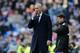 Real Madrid's headcoach Zinedine Zidane reacts as he watches the Spanish La Liga soccer match between Real Madrid and Atletico Madrid at the Santiago Bernabeu stadium in Madrid, Spain, Saturday Feb. 27, 2016. Atletico won the match 1-0. (AP Photo/Paul White)