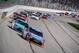 Pole sitter Kyle Busch leads the field early in a NASCAR XFinity Series auto race at Atlanta Motor Speedway Saturday, Feb. 27, 2016, in Hampton, Ga. (AP Photo/John Amis)