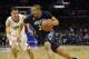 Minnesota Timberwolves guard Andre Miller, right, drives by Los Angeles Clippers guard Pablo Prigioni, of Argentina, during the second half of an NBA basketball game, Wednesday, Feb. 3, 2016, in Los Angeles. The Timberwolves won 108-102. (AP Photo/Mark J. Terrill)