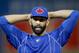 Toronto Blue Jays right fielder Jose Bautista warms up before Game 3 of baseball's American League Championship Series against the Kansas City Royals on Monday, Oct. 19, 2015, in Toronto. (AP Photo/Paul Sancya)