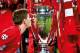 Liverpool captain Steven Gerrard kisses the winner's trophy at the presentation after his side beat AC Milan on penalties at the Champions League Final in the Ataturk Stadium on May 25th 2005 in Istanbul, Turkey (Photo by Tom Jenkins/Getty Images). An image from the book 'In The Moment' published June 2012