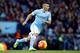 Manchester City's Sergio Aguero runs with the ball during the English Premier League soccer match between Manchester City and Tottenham Hotspur's at the Etihad Stadium in Manchester, England, Sunday Feb. 14, 2016. (AP Photo/Jon Super)